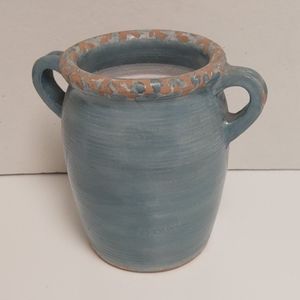 Distressed large urn